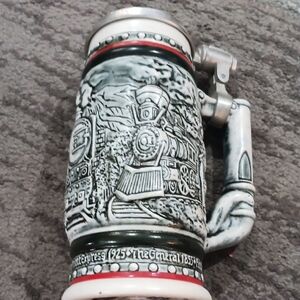 Avon Collectible Stein with Black and White Base